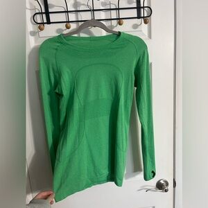 LULU LEMON size medium, longer torso style, gently worn, bright green